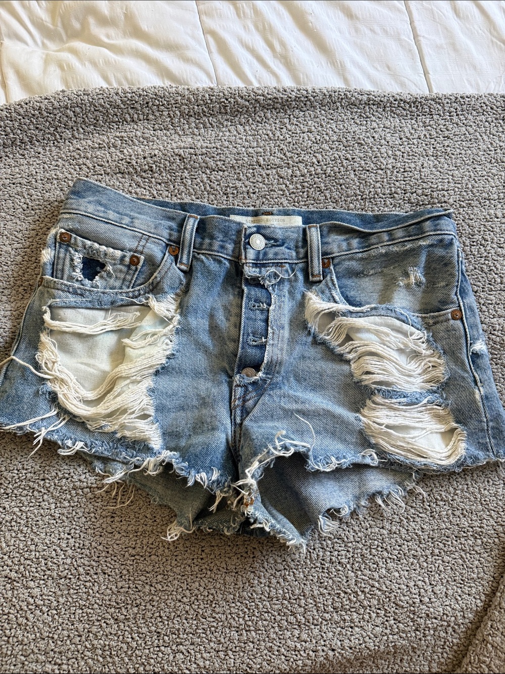 Levi's Distressed Light Blue Denim Cutoff Shorts
